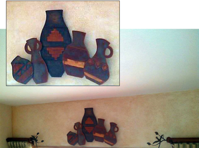 Custom Pottery Art bridges the custom-made window treatments on each side. (Inset shows closeup of pots.)