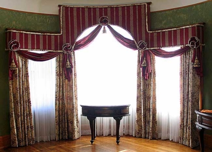 Cornice Box with Large Welt of Rosettes; Soft Swag with Tassels & Cording; Coordinating Side Panels.