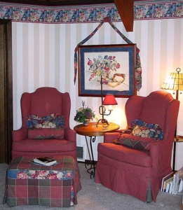 Slip-covered, Wing-backed Chairs.