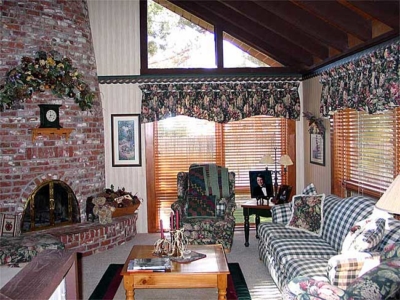 Window Treatments & Coordinating Furniture; Floral Swag over Fireplace & Custom Area Rug.