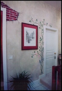 An Artist's Touch can add interest even to the smallest areas! Small area of Hand-painted Faux Brick Work w/ Ivy Vines surrounding Door and Artwork.