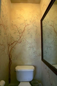 Tree Mural reflected in a large Mirror makes this small bathroom appear larger.