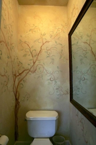 Tree Mural reflected in a large Mirror makes this small bathroom appear larger.