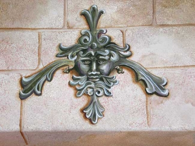 A certain accent piece was desired over kitchen doorway, but was not available for purchase. A replica was hand-painted there instead, much to the homeowner's delight!